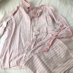 Victoria’s secret pjs. Pink, white and silver stripes.